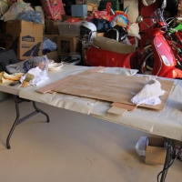 Sanding down the plywood