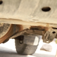 Axle oil leak. Don't look good.